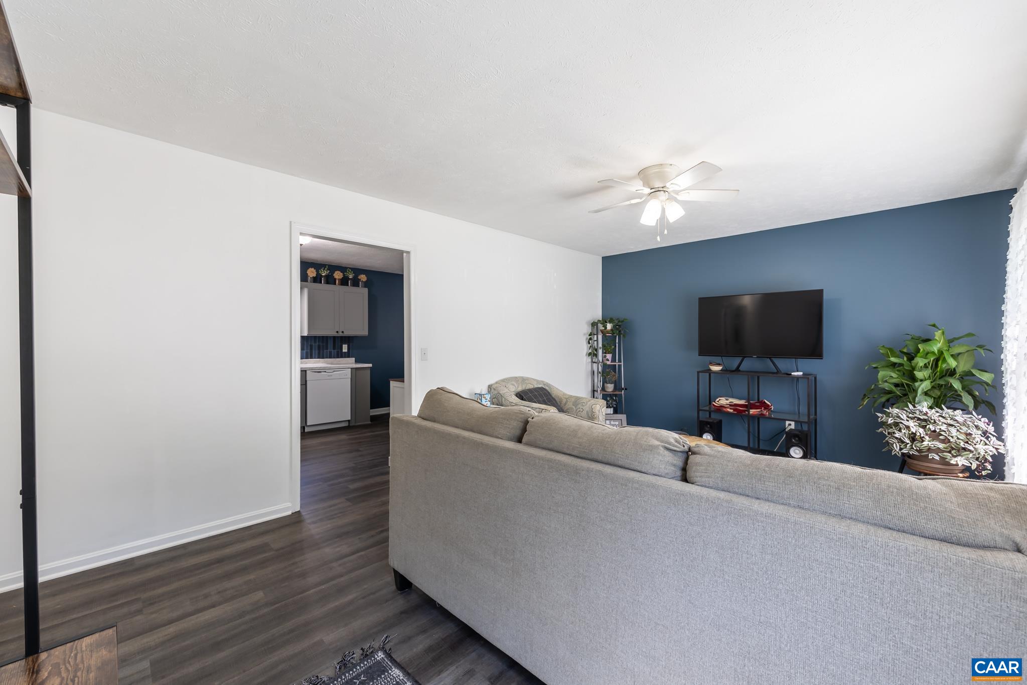 100 Holmes Run Road Stanardsville, VA 22973 - Photo 6 of 22 a living room with furniture and a flat screen tv