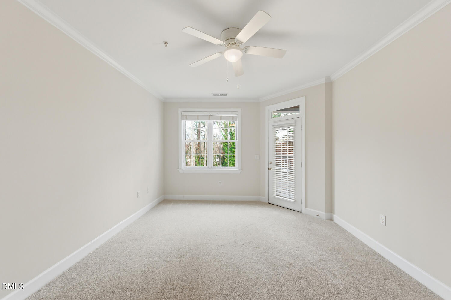 116 Northbrook Drive, Unit 204 Raleigh, NC 27609 - Photo 32 of 94 an empty room with windows and ceiling fan