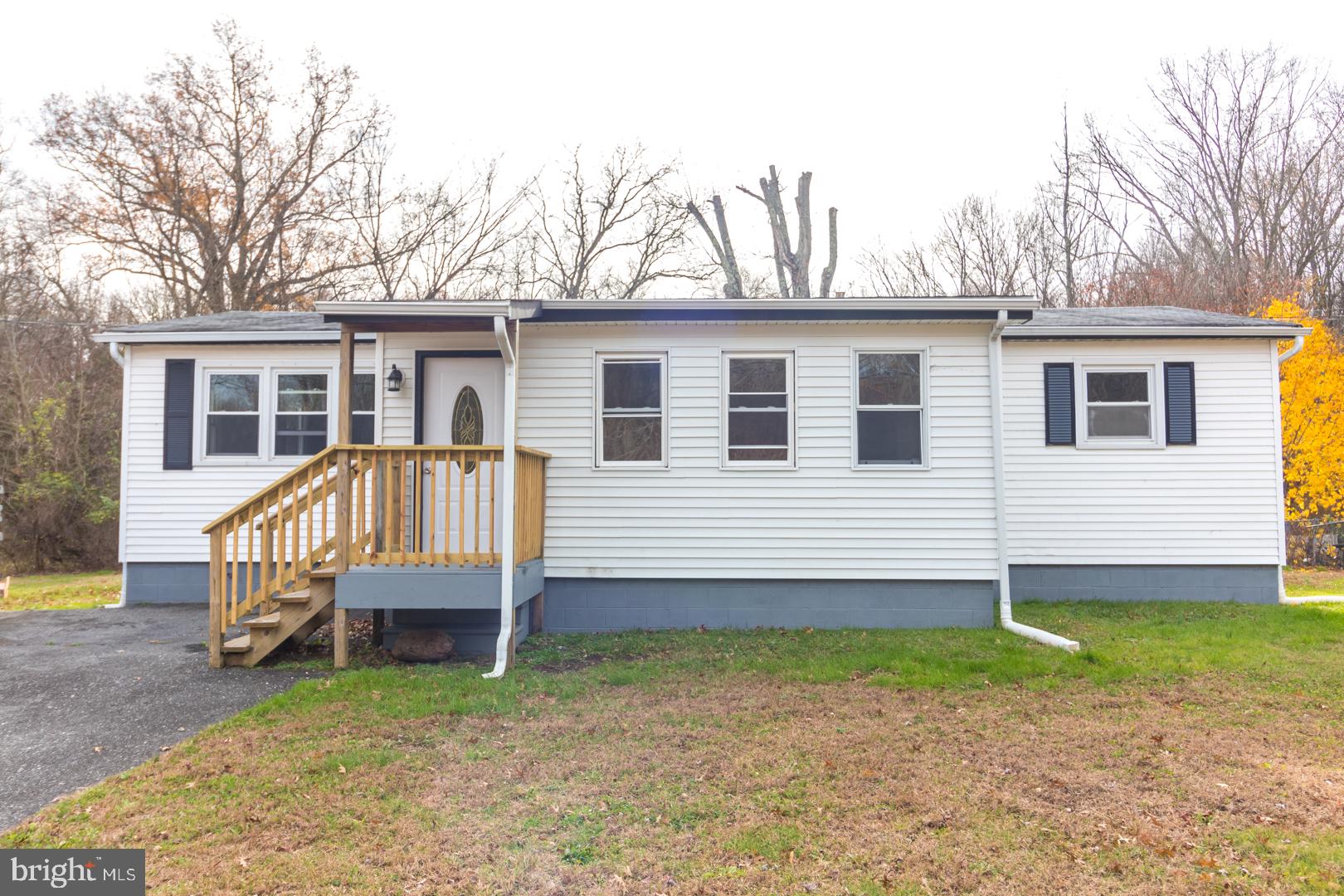 320 Fenwick Road Pilesgrove, NJ 08098 - Photo 18 of 18 a view of a house with a yard