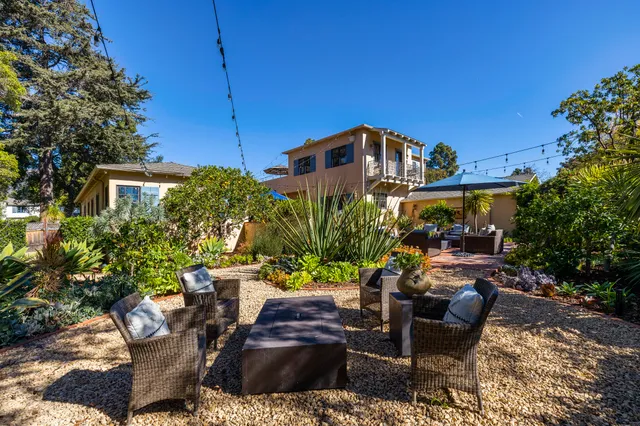 a view of a patio in backyard