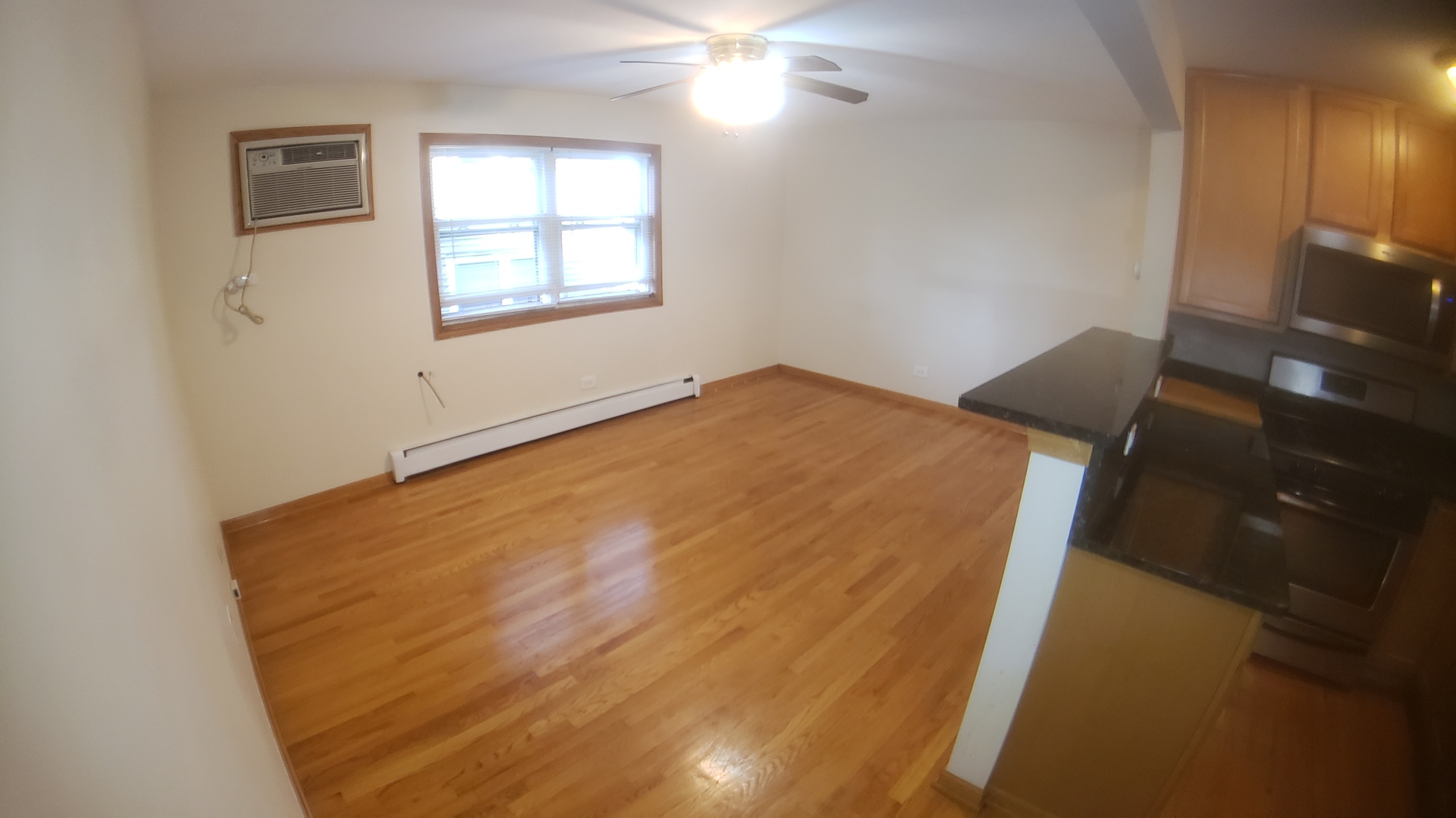 1124 Dunlop Avenue, Unit 2C Forest Park, IL 60130 - Photo 13 of 25 a view of empty room with window