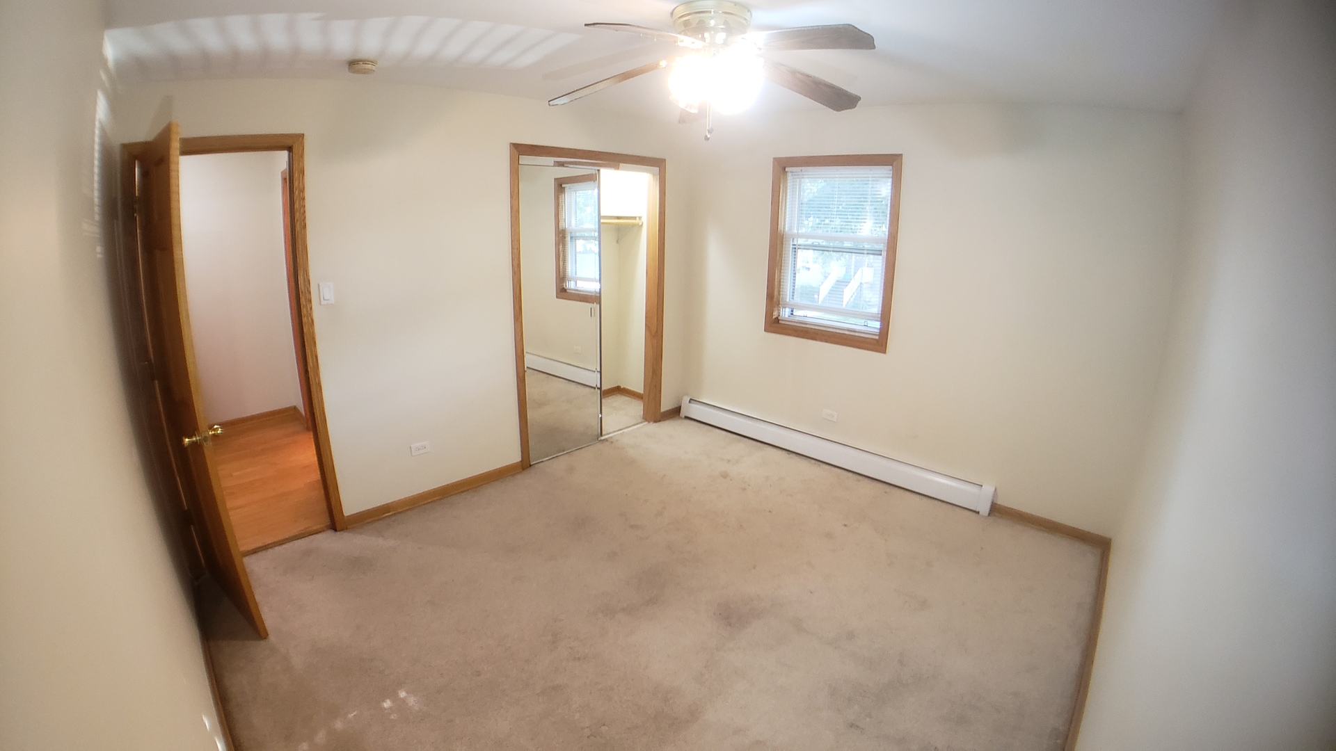 1124 Dunlop Avenue, Unit 2C Forest Park, IL 60130 - Photo 17 of 25 an empty room with windows and closet