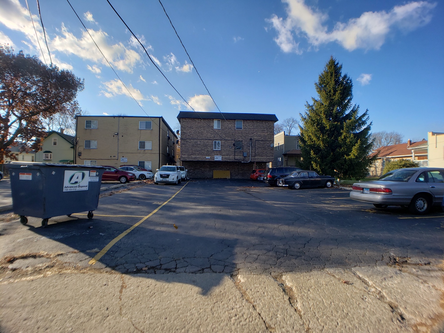 1124 Dunlop Avenue, Unit 2C Forest Park, IL 60130 - Photo 24 of 25 a view of street with parked cars