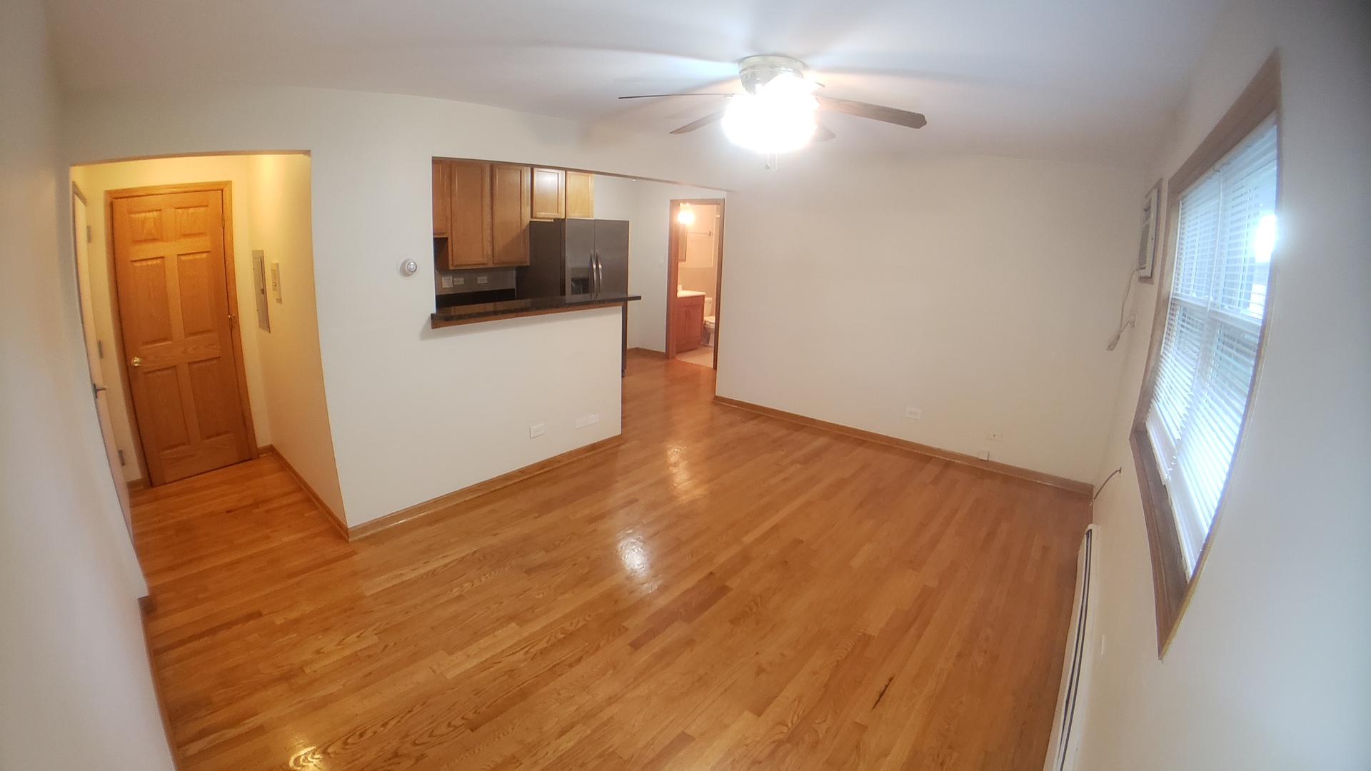1124 Dunlop Avenue, Unit 2C Forest Park, IL 60130 - Photo 9 of 25 a view of a kitchen from a hallway