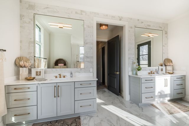 a living room with a couch and a window