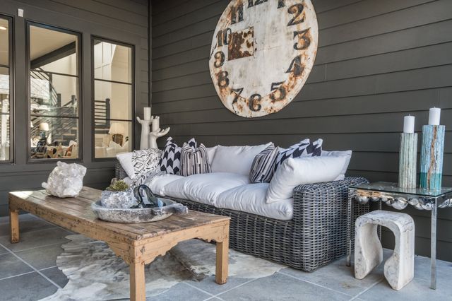 a view of a swimming pool with sitting area