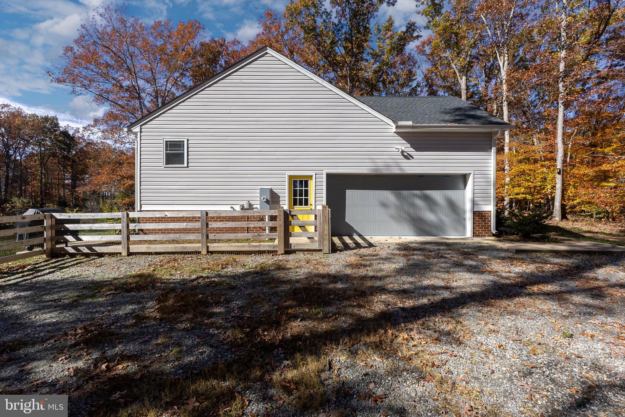600 Signboard Road Bumpass, VA 23024 - Photo 40 of 49 a view of a house with a yard