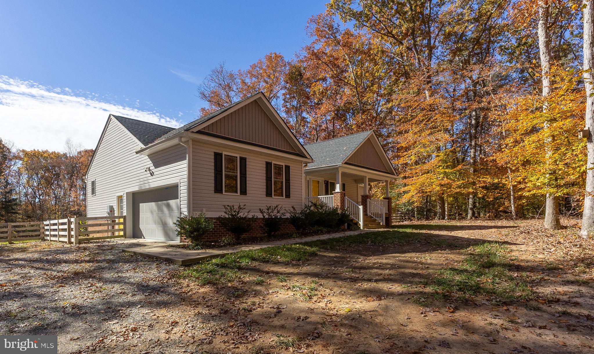 600 Signboard Road Bumpass, VA 23024 - Photo 6 of 49 a front view of a house with a yard