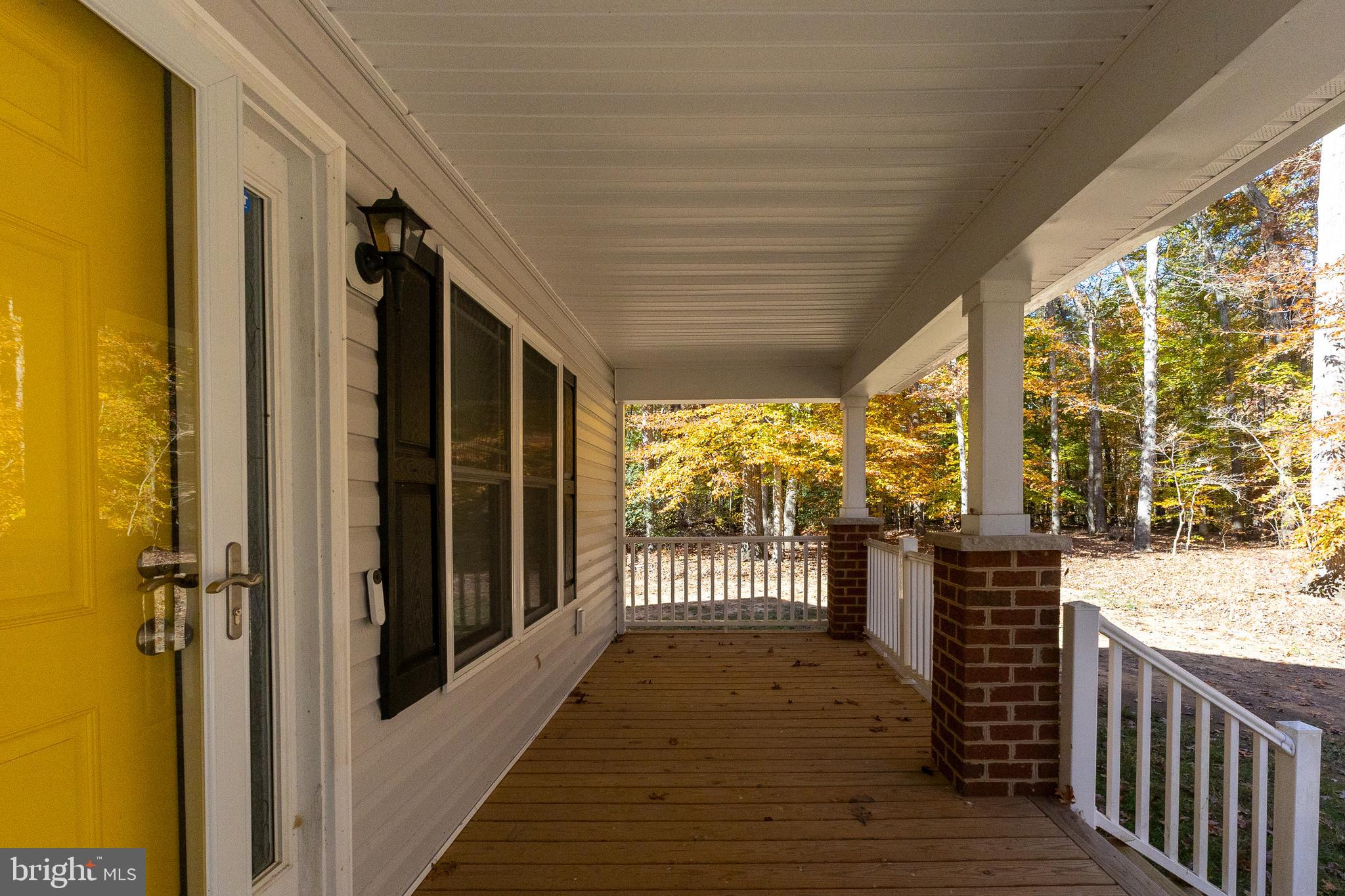 600 Signboard Road Bumpass, VA 23024 - Photo 8 of 49 a view of a porch with wooden floor and outdoor space