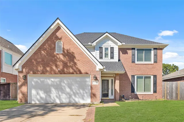 a front view of house with yard