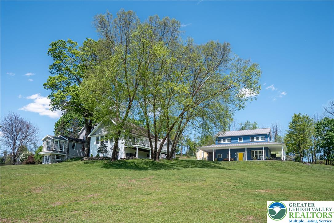 1072 5 Points Richmond Road Bangor, PA 18013 - Photo 10 of 66 a front view of a house with a garden