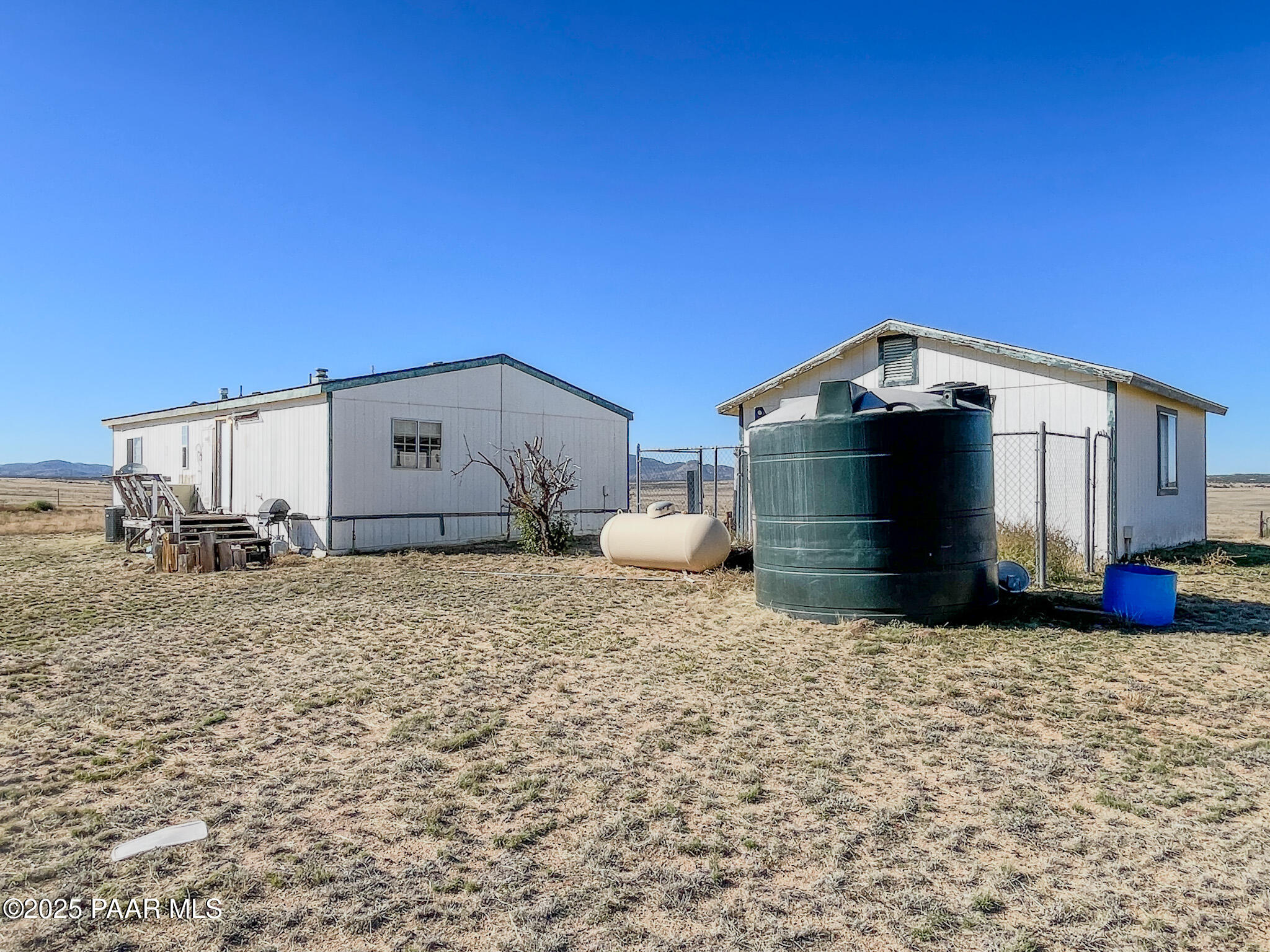 1355 South Reed Road Chino Valley, AZ 86323 - Photo 35 of 35 a view of a house with a yard