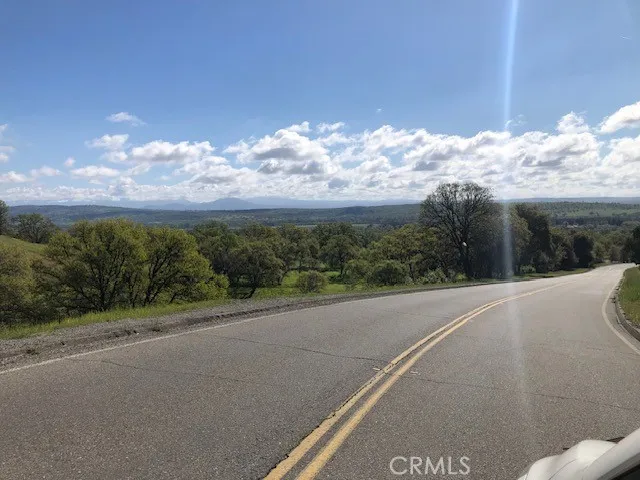 a view of a city street from a yard