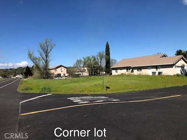 a view of a house with a big yard