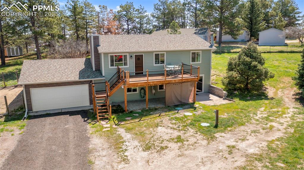 1151 Buttercup Road Elizabeth, CO 80107 - Photo 11 of 45 a view of house with outdoor space