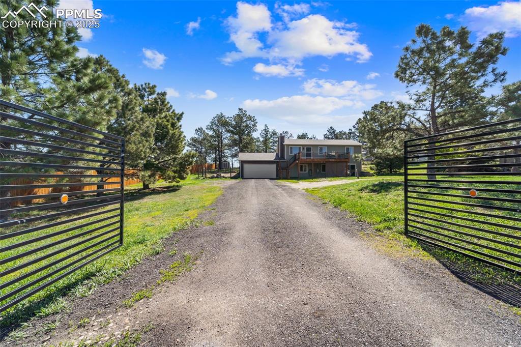 1151 Buttercup Road Elizabeth, CO 80107 - Photo 17 of 45 a view of a park with large trees