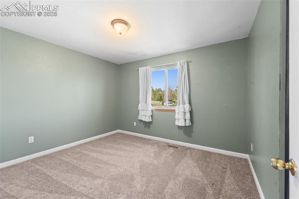 1151 Buttercup Road Elizabeth, CO 80107 - Photo 31 of 45 a view of a room with window