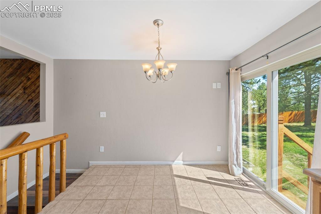 1151 Buttercup Road Elizabeth, CO 80107 - Photo 36 of 45 a view of livingroom with furniture wooden floor and window