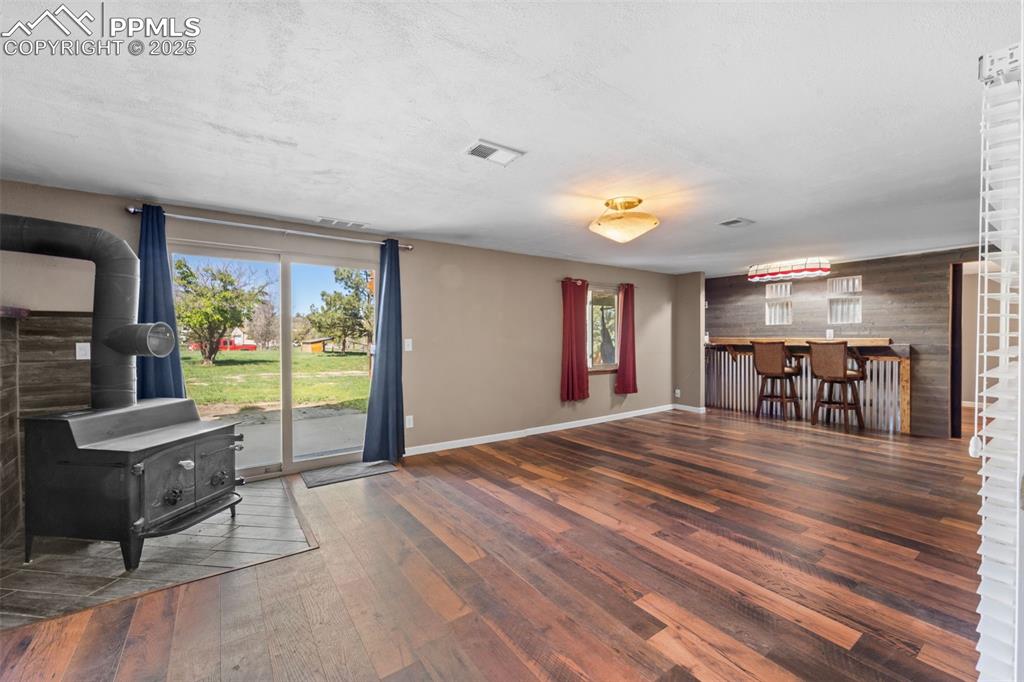 1151 Buttercup Road Elizabeth, CO 80107 - Photo 44 of 45 a view of livingroom with furniture window and outside view
