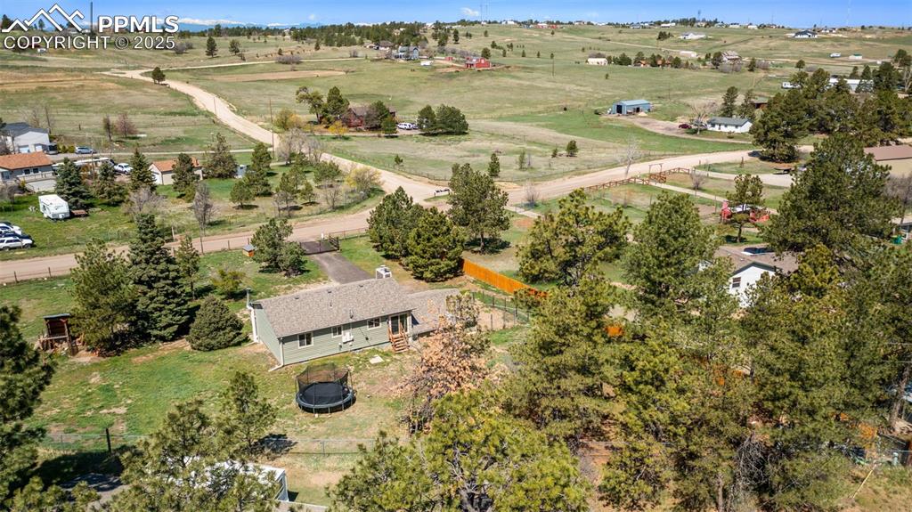 1151 Buttercup Road Elizabeth, CO 80107 - Photo 6 of 45 an aerial view of residential houses with outdoor space