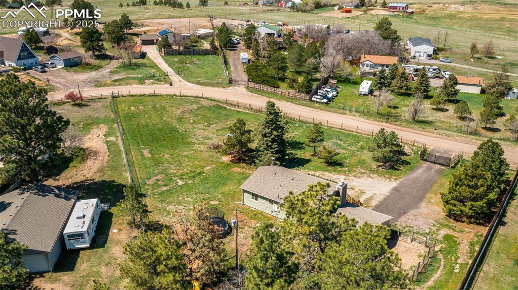 1151 Buttercup Road Elizabeth, CO 80107 - Photo 7 of 45 an aerial view of residential houses with outdoor space