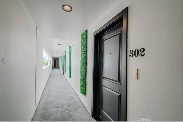 a kitchen with stainless steel appliances a refrigerator stove and sink