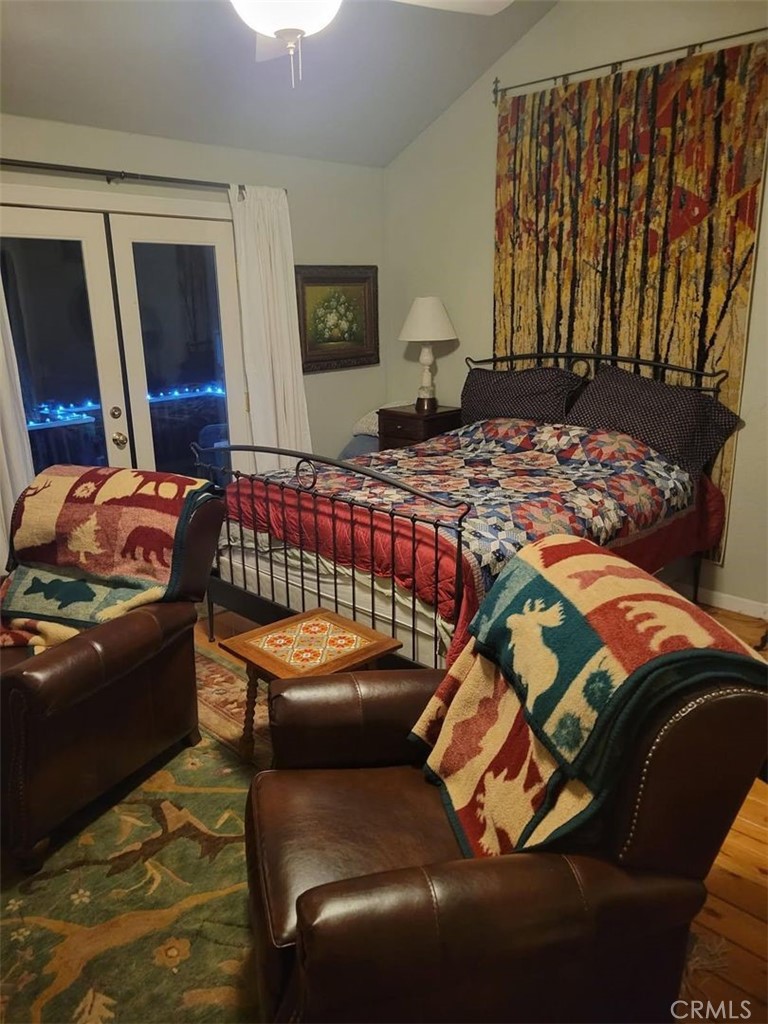 29591 Hook Creek Road Cedar Glen, CA 92321 - Photo 7 of 14 a bedroom with a bed and window