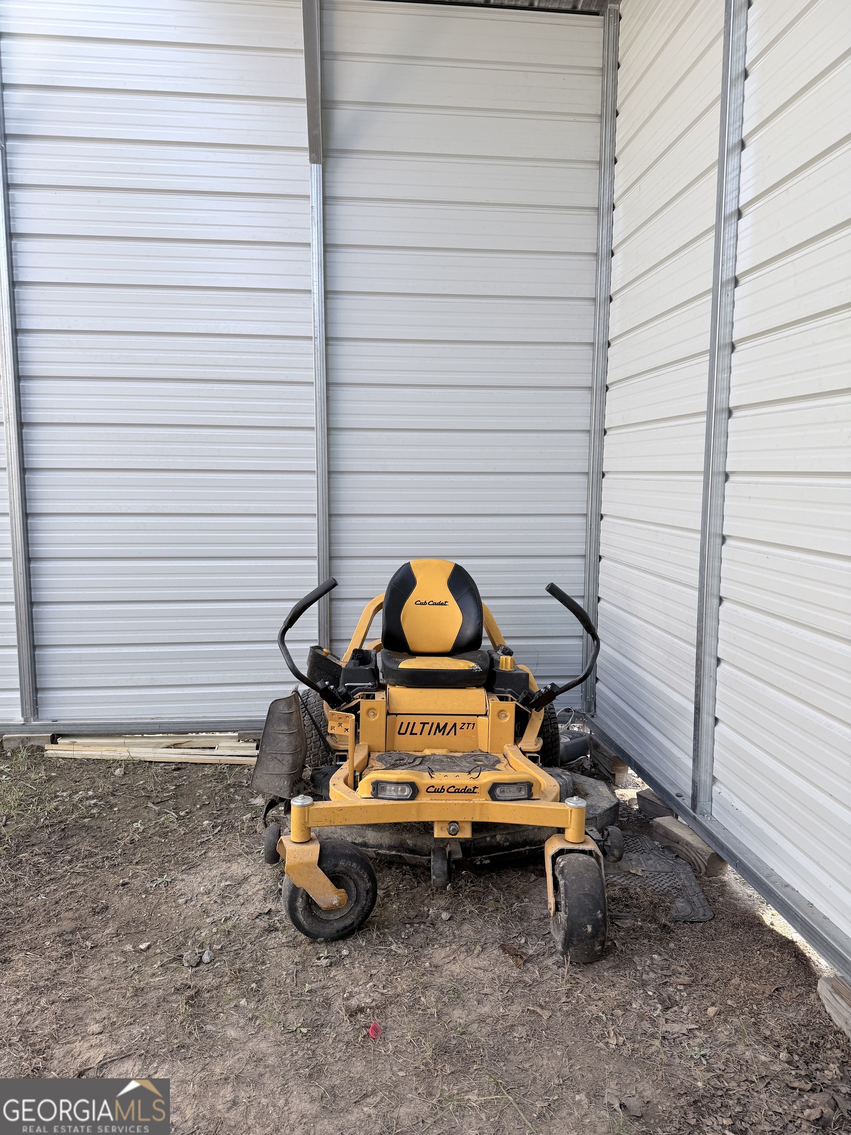 195 Margarets Grove Road Crawfordville, GA 30631 - Photo 15 of 34 a backyard of a house with fire pit