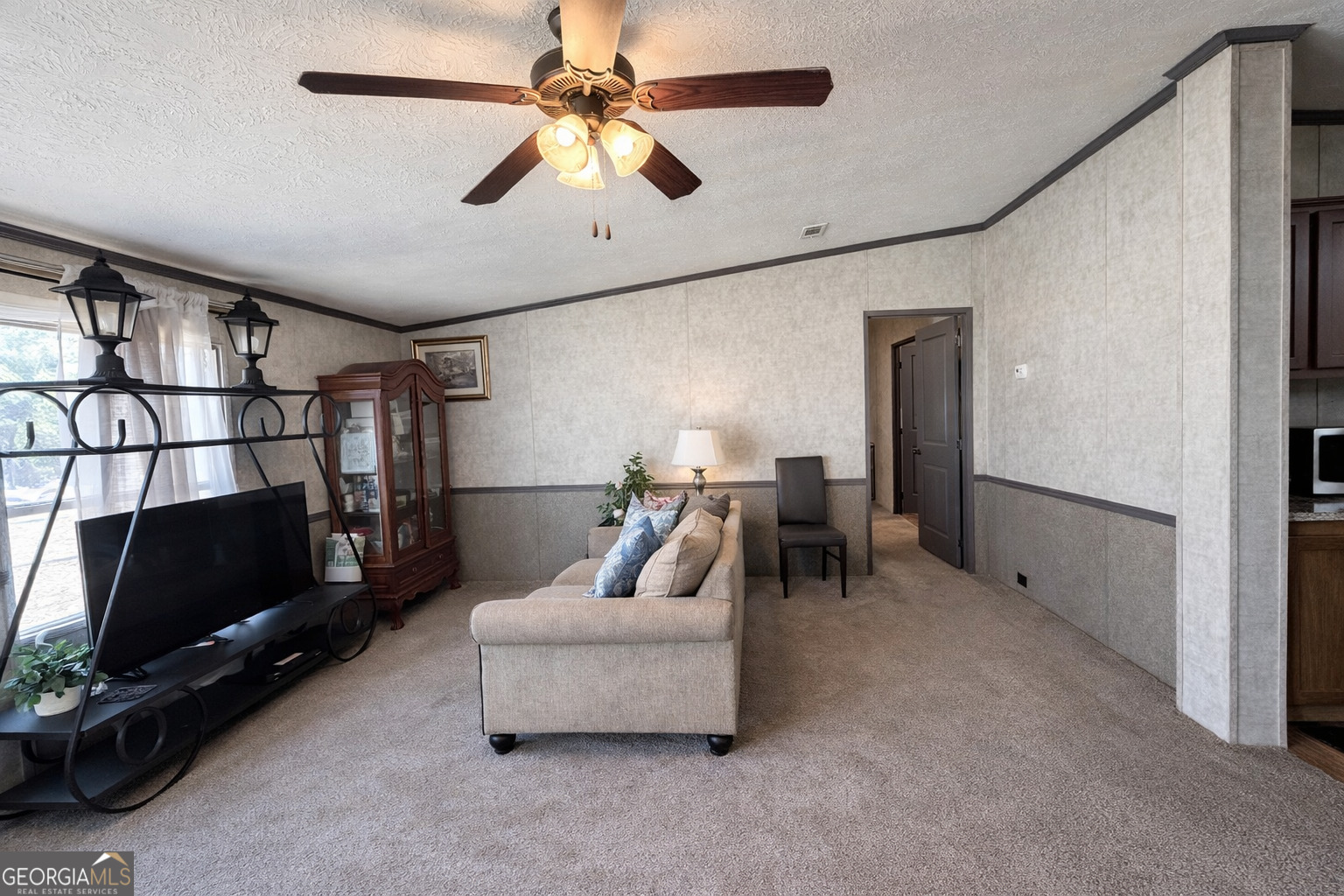 195 Margarets Grove Road Crawfordville, GA 30631 - Photo 4 of 34 a living room with furniture and a flat screen tv