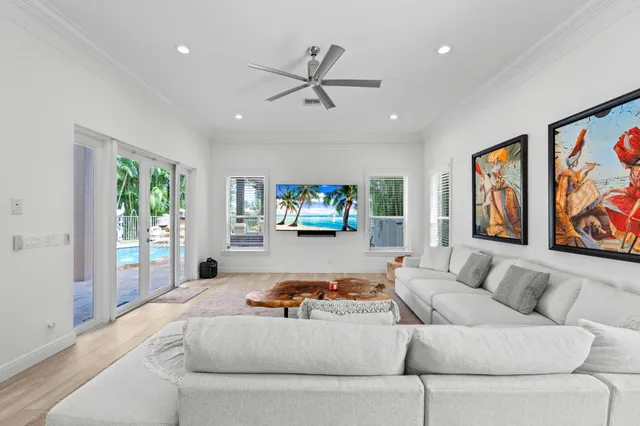 a bedroom with a bed and a flat tv screen