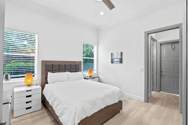 a bedroom with a bed and a dresser