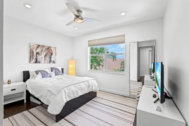 a spacious bathroom with a large tub shower and sink