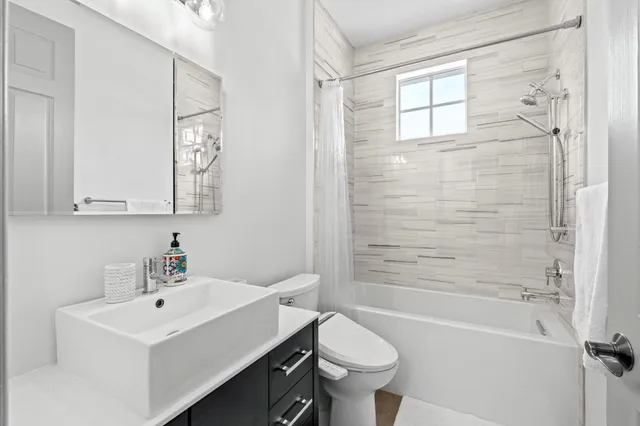 a view of a house with backyard porch and sitting area