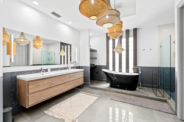 a view of a lake with houses in the back