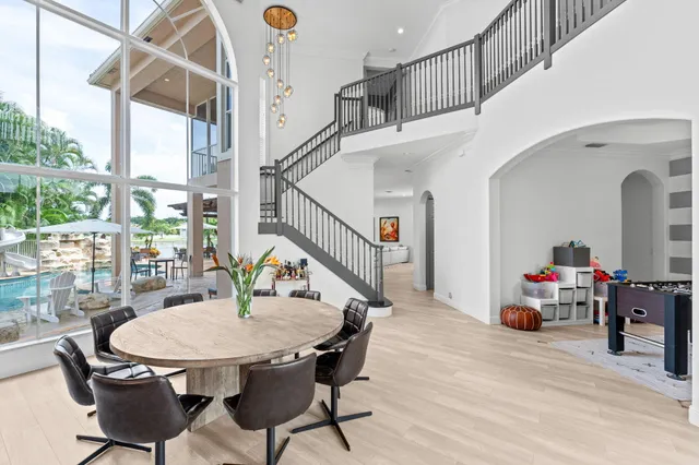 a view of a dining room with furniture window and outside view