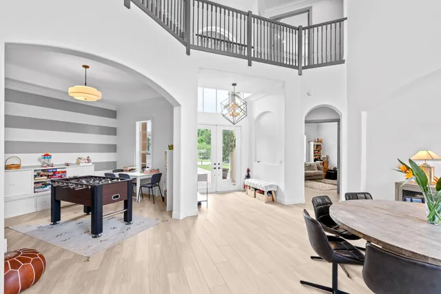 a kitchen with stainless steel appliances granite countertop a sink and a stove