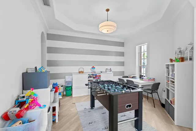 a kitchen with stainless steel appliances granite countertop sink stove and refrigerator