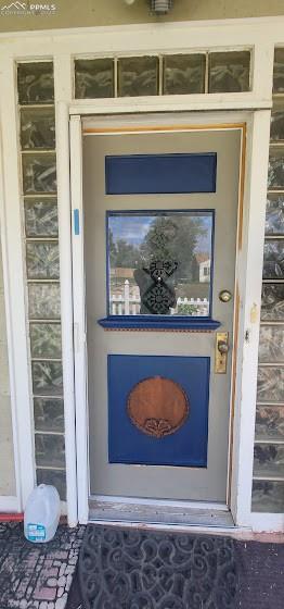 209 Indiana Avenue Walsenburg, CO 81089 - Photo 2 of 37 a front view of a house with a door