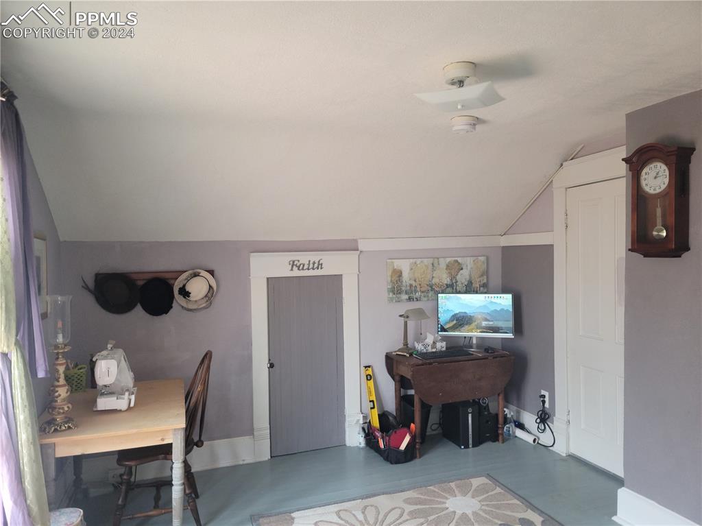 209 Indiana Avenue Walsenburg, CO 81089 - Photo 26 of 37 a bedroom with furniture and a window