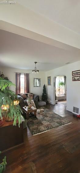 209 Indiana Avenue Walsenburg, CO 81089 - Photo 3 of 37 a living room with furniture and a floor to ceiling window