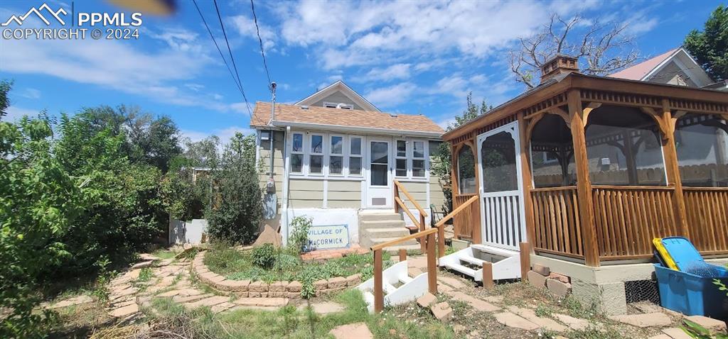 209 Indiana Avenue Walsenburg, CO 81089 - Photo 32 of 37 a front view of a house with a yard