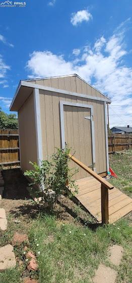 209 Indiana Avenue Walsenburg, CO 81089 - Photo 34 of 37 a backyard of a house with lots of green space