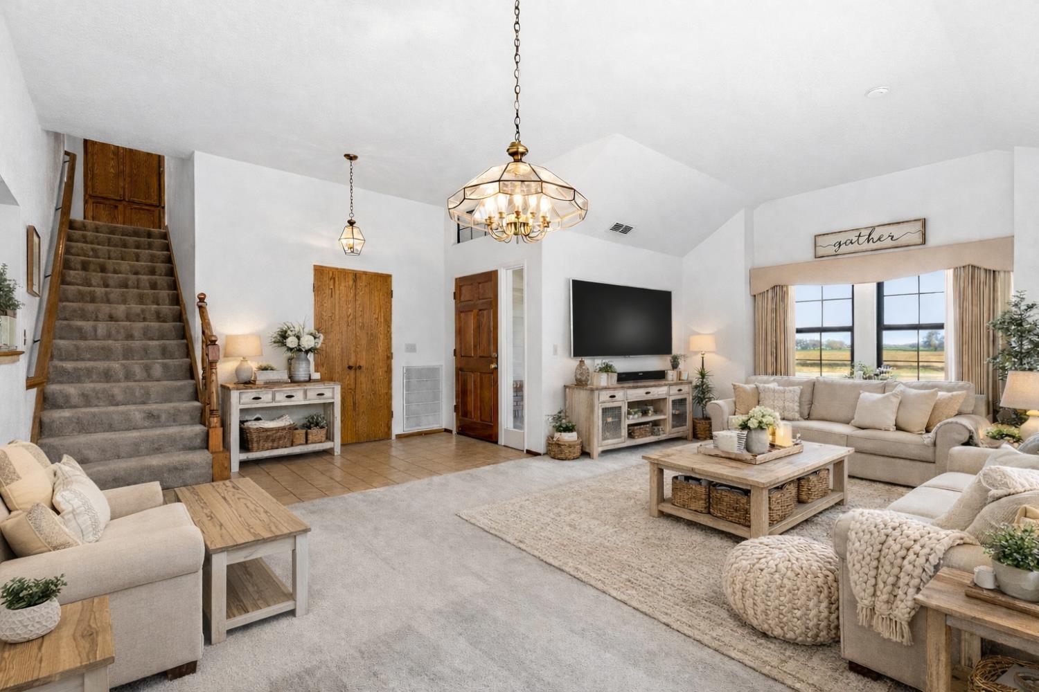 8711 Fruchtenicht Road Knights Landing, CA 95645 - Photo 11 of 44 a living room with furniture and a flat screen tv