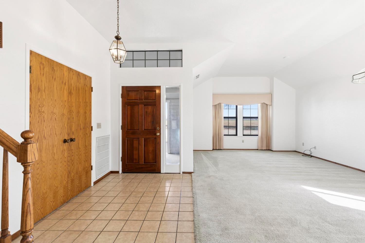 8711 Fruchtenicht Road Knights Landing, CA 95645 - Photo 12 of 44 a view of an empty room with window and cabinet