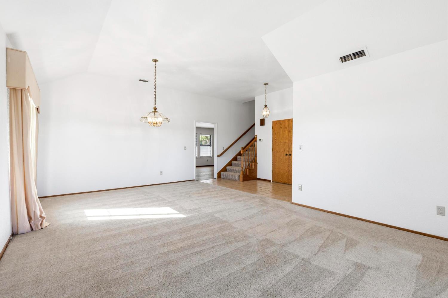 8711 Fruchtenicht Road Knights Landing, CA 95645 - Photo 13 of 44 a view of an empty room with stairs