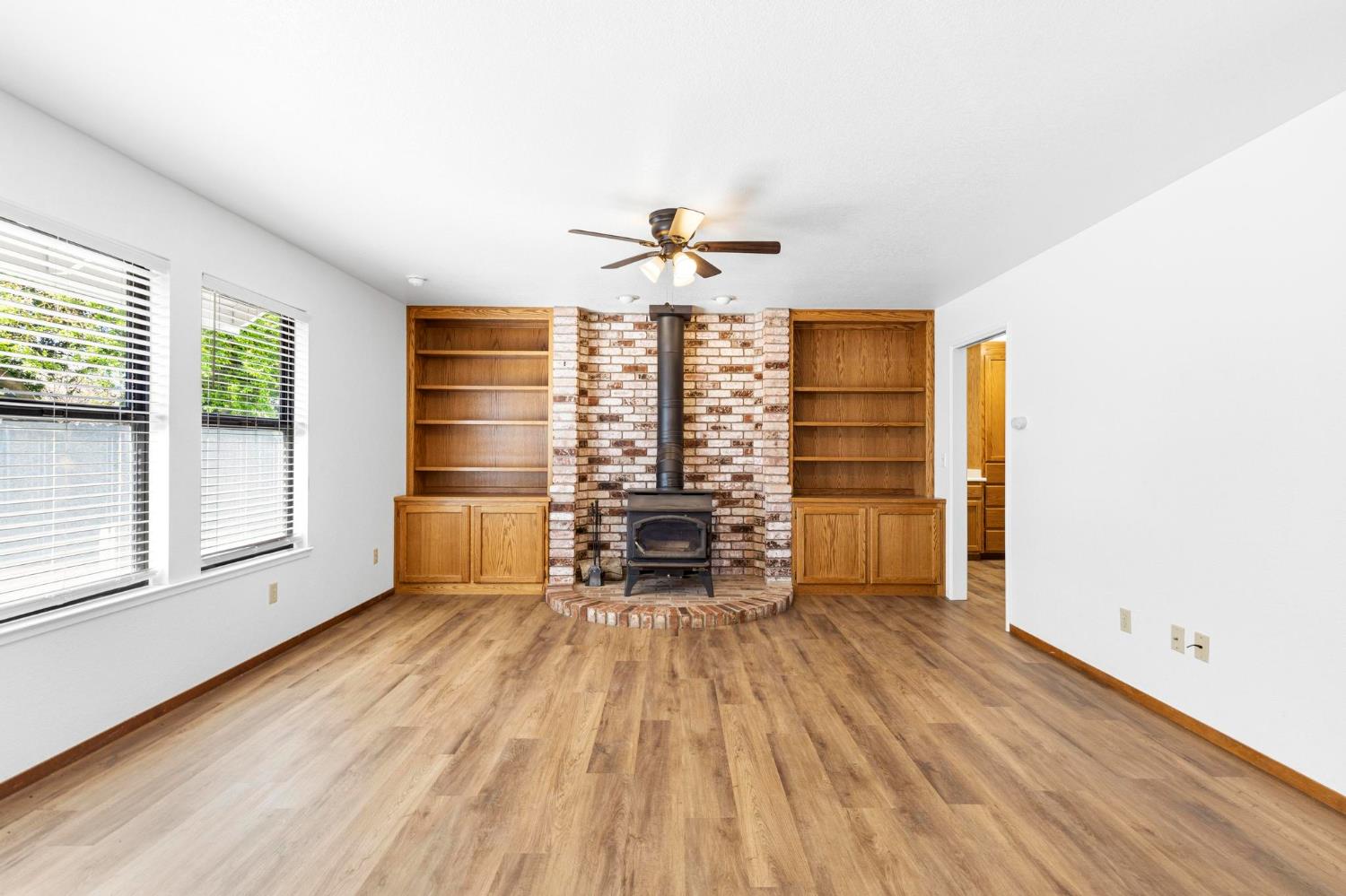 8711 Fruchtenicht Road Knights Landing, CA 95645 - Photo 16 of 44 wooden floor in an empty room with a window
