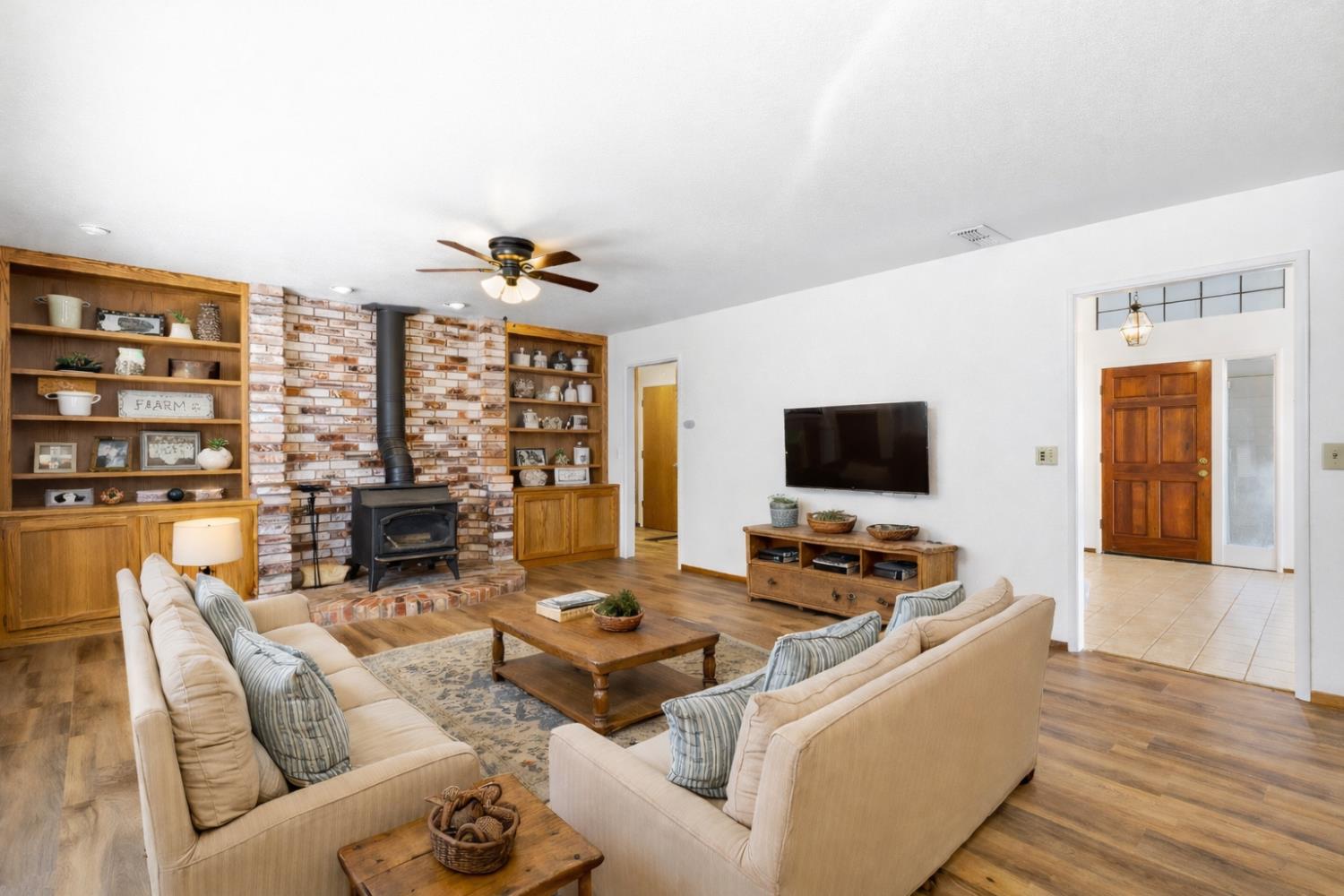 8711 Fruchtenicht Road Knights Landing, CA 95645 - Photo 17 of 44 a living room with furniture and a flat screen tv