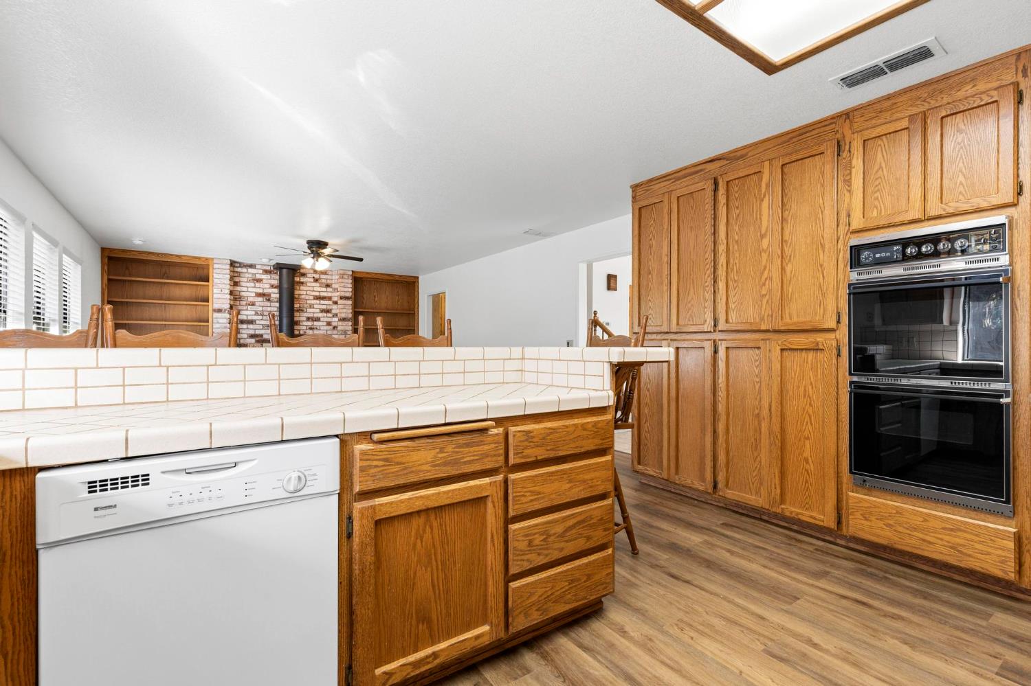8711 Fruchtenicht Road Knights Landing, CA 95645 - Photo 20 of 44 a kitchen with stainless steel appliances granite countertop a refrigerator and a stove top oven