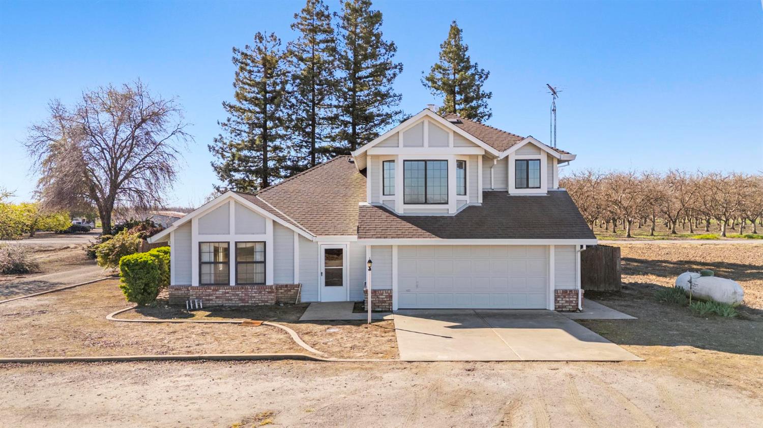 8711 Fruchtenicht Road Knights Landing, CA 95645 - Photo 2 of 44 a front view of a house with a yard