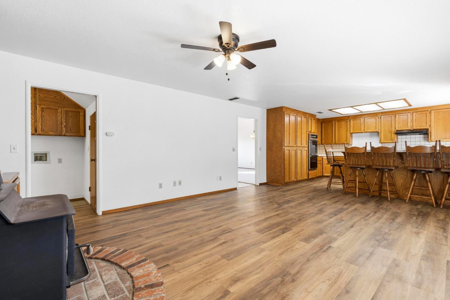 8711 Fruchtenicht Road Knights Landing, CA 95645 - Photo 22 of 44 a view of a livingroom with furniture and wooden floor